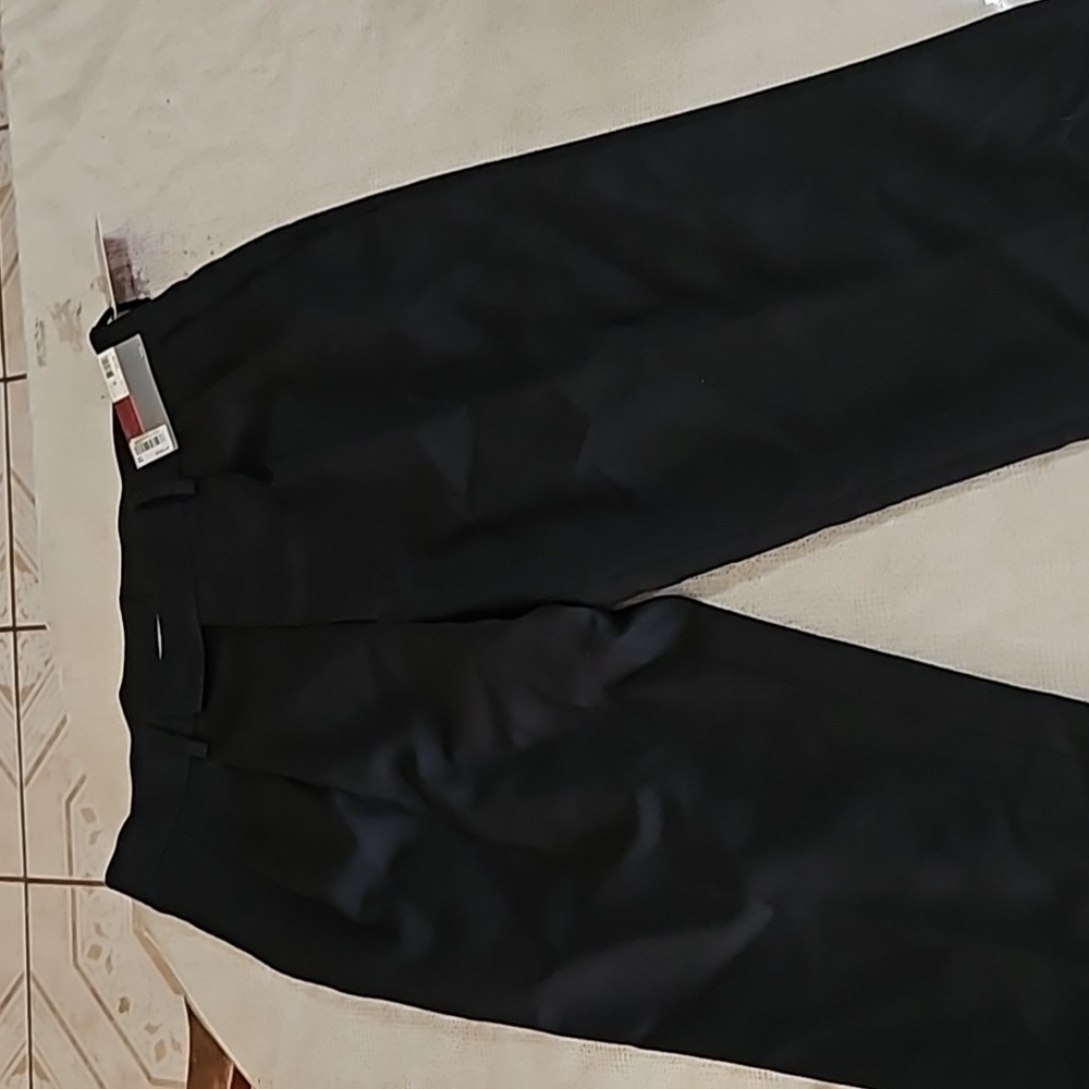 Black pleated trousers